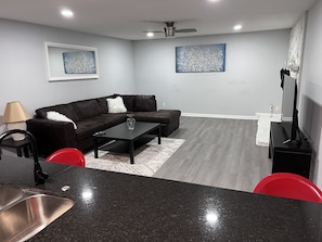 Living area - Modern & Renovated 3 bedroom delight, near Stone Mountain 25 mins from Metro ATL (Snellville)