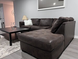 Living area - Modern & Renovated 3 bedroom delight, near Stone Mountain 25 mins from Metro ATL (Snellville)