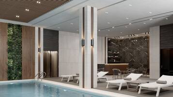 Indoor pool, open 7:00 AM to 11:00 AM, pool loungers, lifeguards on site