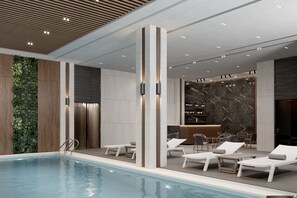 Indoor pool, open 7:00 AM to 11:00 AM, sun loungers, lifeguards on site