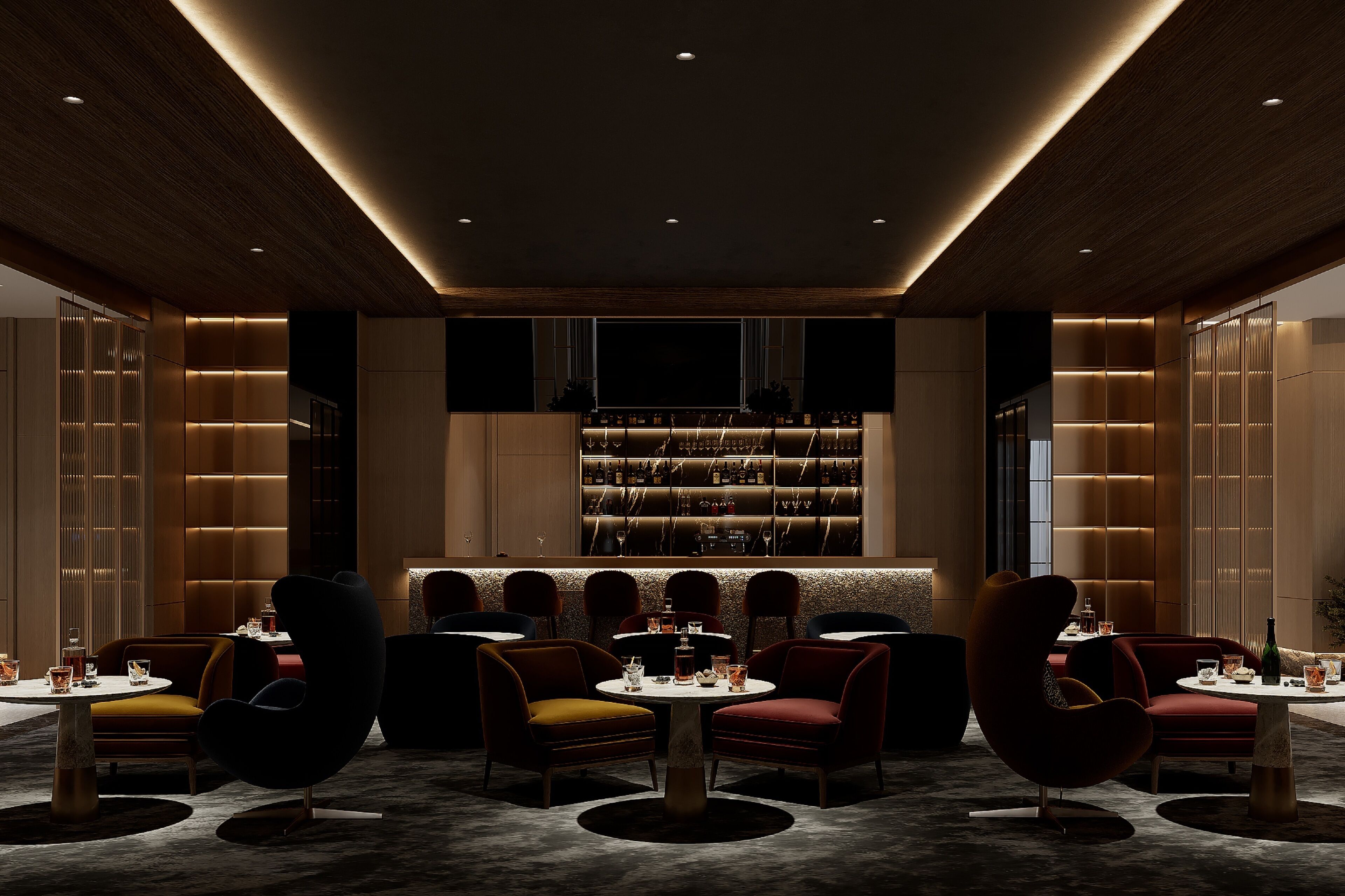 Un'area bar moderna con un bancone centrale, diverse opzioni di seduta e una vetrina per il vino.