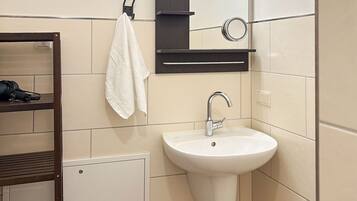 Hair dryer, towels, soap, toilet paper