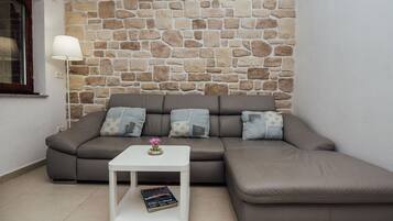 Comfort Apartment A2 | Living area | 100-cm flat-screen TV with satellite channels, TV