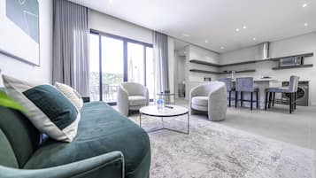 Apartment, 3 Bedrooms | Living area | 60-inch LCD TV with digital channels, TV
