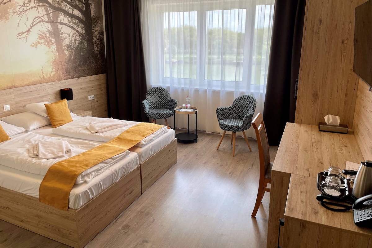 In-room safe, desk, laptop workspace, blackout curtains