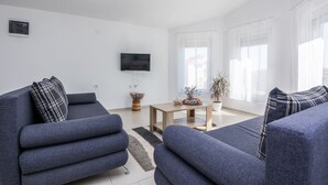 Family Apartment (A1) | 起居區 | 100-公分平面電視、衛星頻道、電視