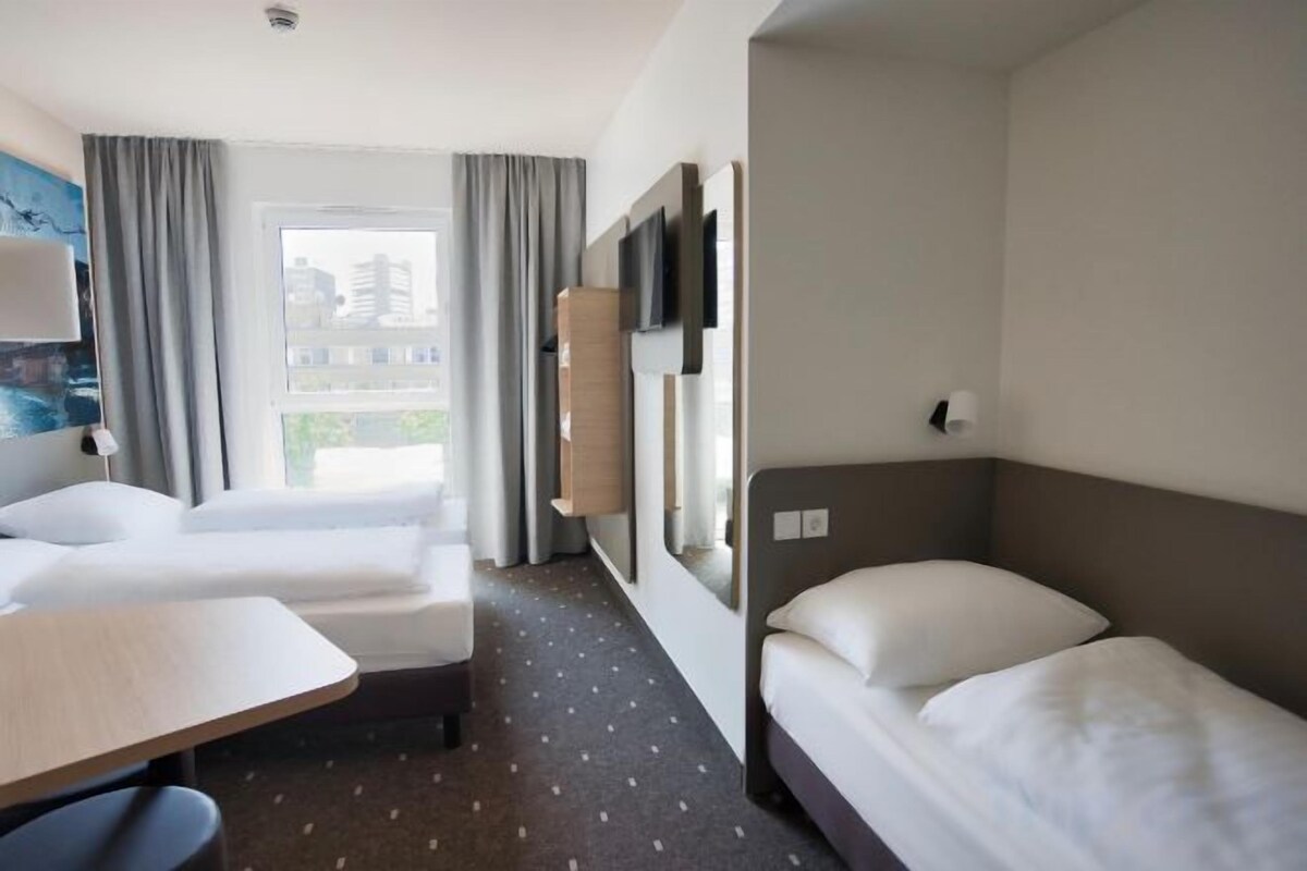 Desk, WiFi (free), bed sheets