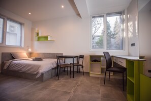 Desk, laptop workspace, free WiFi, bed sheets