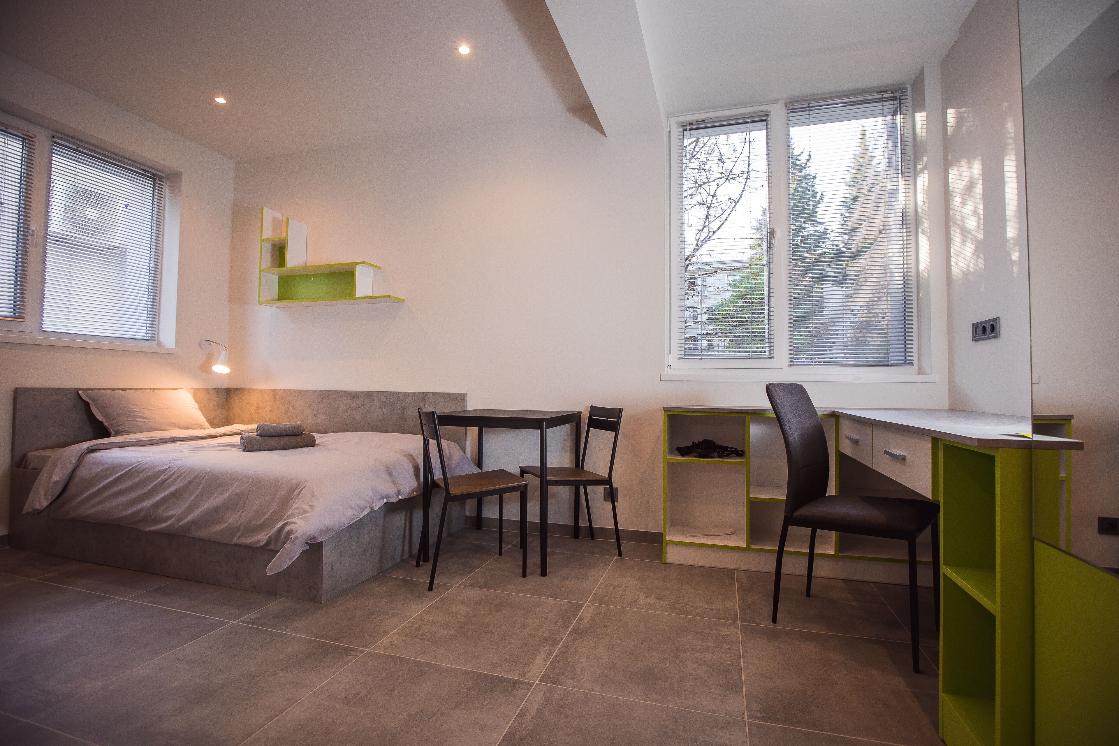 Desk, laptop workspace, free WiFi, bed sheets
