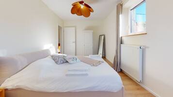 2 slaapkamers, een strijkplank/strijkijzer, gratis wifi, beddengoed