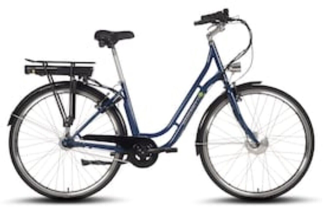 A stationary bicycle with a front basket and a rear rack.