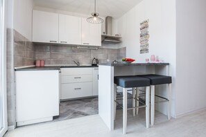 City Apartment A1 | Private kitchen | Fridge, microwave, oven, stovetop - Apartments Krpan (Vir)