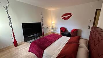 Habitación Deluxe | Ropa de cama de alta calidad, edredón y camas con efecto memoria