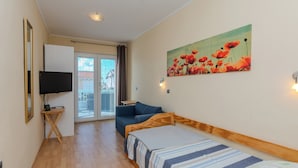 Classic Apartment (A2) | Living area | 100-cm flat-screen TV with satellite channels, TV - Apartments Jozef (Vir)