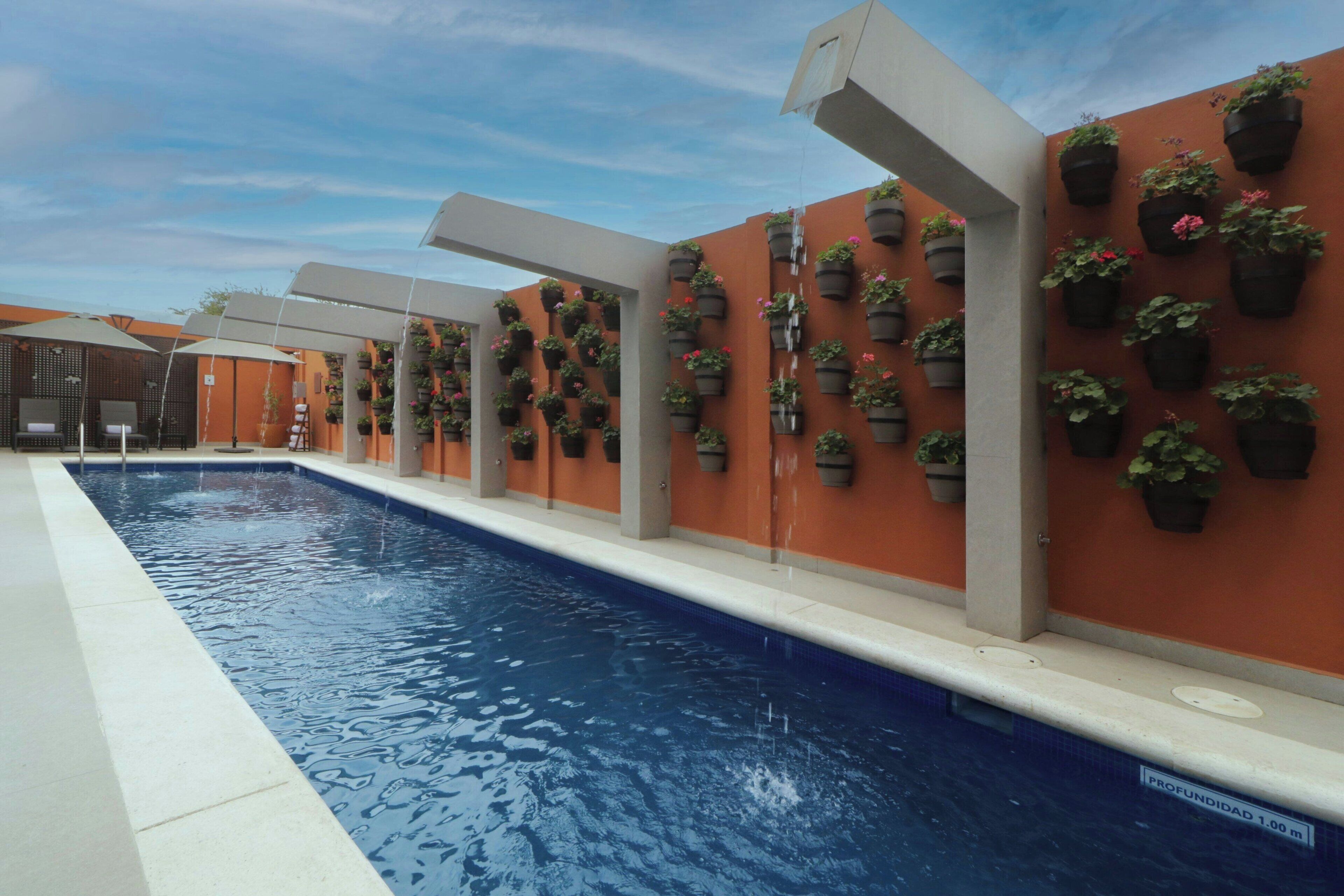 Outdoor pool, pool umbrellas, pool loungers