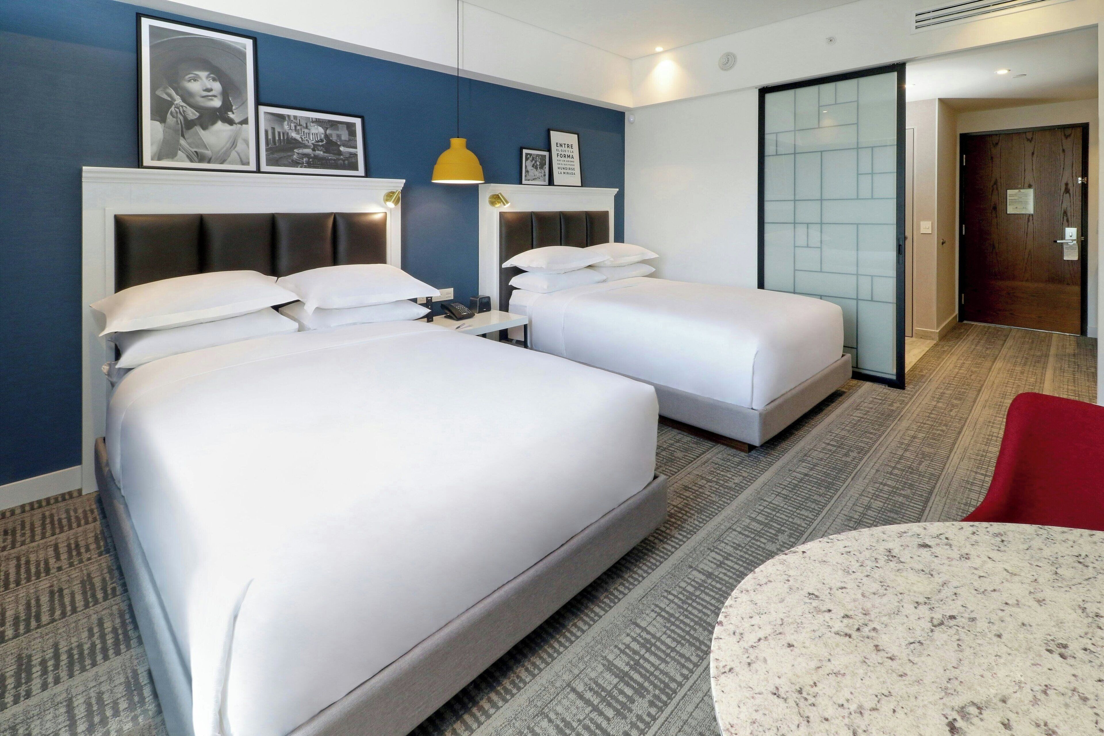 Standard Room, 2 Double Beds | In-room safe, desk, laptop workspace, blackout drapes