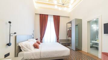 Deluxe Double Room | Minibar, in-room safe, individually decorated, individually furnished