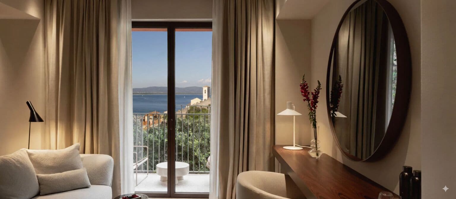 Junior Suite, Terrace, Sea View (Ercoletto) | Minibar, in-room safe, desk, laptop workspace