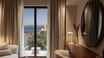 Junior Suite, Terrace, Sea View (Ercoletto) | Minibar, in-room safe, desk, laptop workspace