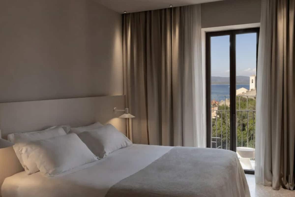 Junior Suite, Terrace, Sea View (Ercoletto) | Minibar, in-room safe, desk, laptop workspace