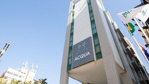 A modern building with a sign reading "ACQUA." - Acqua Prime (Maceió)
