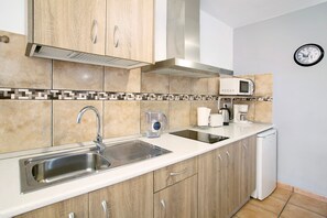 Fridge, microwave, stovetop, coffee/tea maker - 'Montemar 2' Vacation Apartment with Sea Views, Shared Pool, and Wi-Fi (Moya)