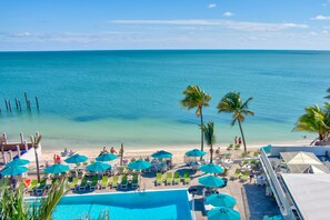 Outdoor pool, a heated pool - Remodeled 3 bedroom 2 bath on 200 foot wide canal with Cabana Club membership.  (KEY COLONY BEACH)