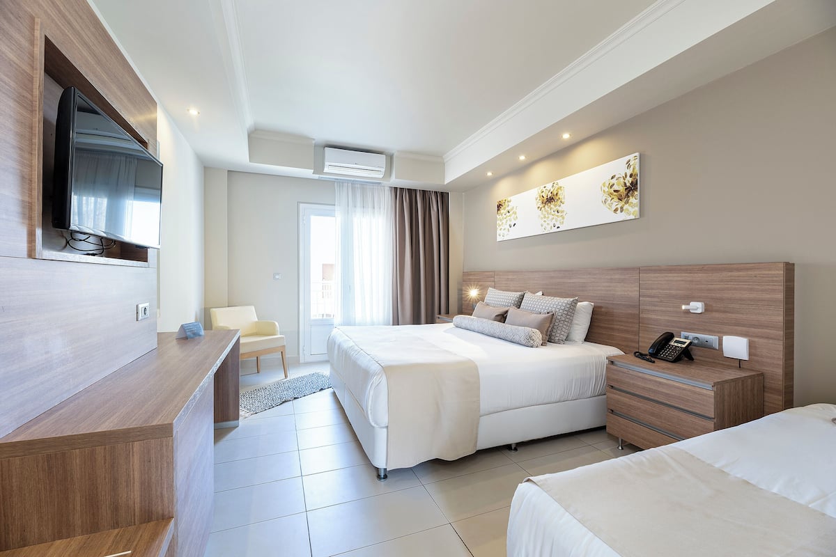 Superior Triple with Inland View | 1 bedroom, hypo-allergenic bedding, in-room safe, laptop workspace