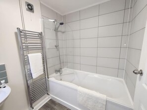 Eco-friendly toiletries, hair dryer, towels, soap
