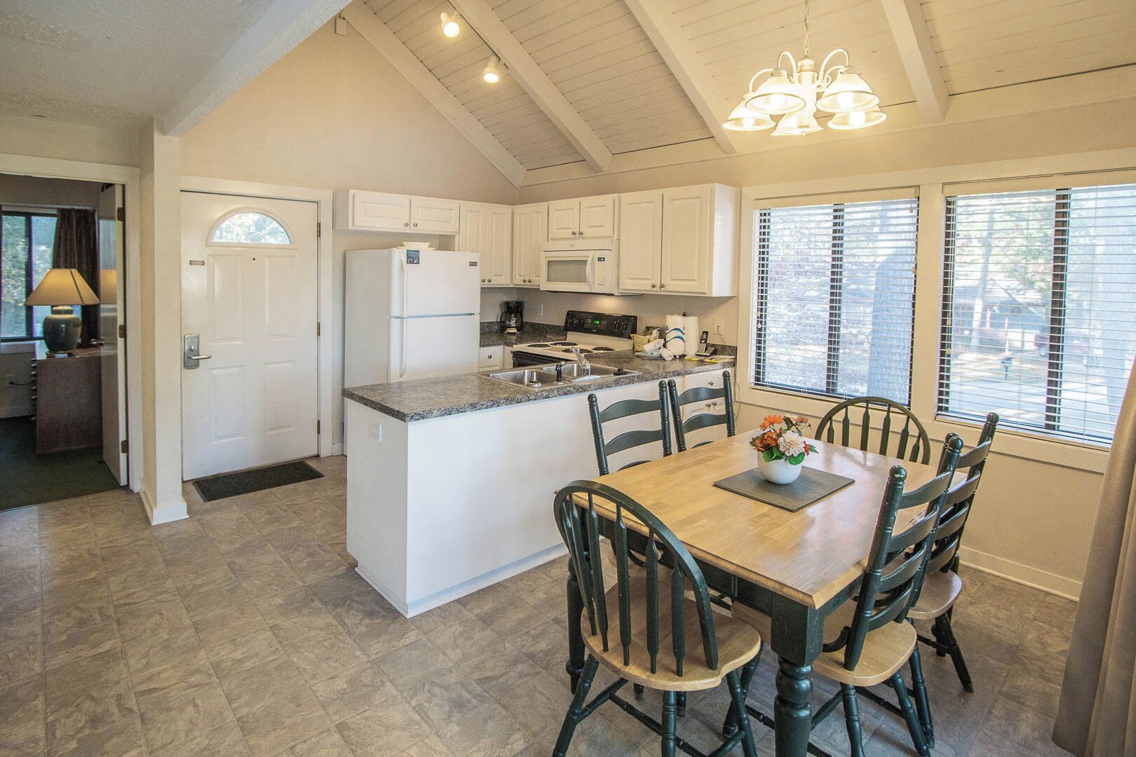 Deluxe Townhome, 2 Bedrooms, Balcony | Private kitchen | Full-size fridge, microwave, oven, stovetop