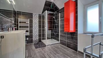 Shower, hair dryer, towels, toilet paper