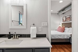 Bathtub, hair dryer, towels