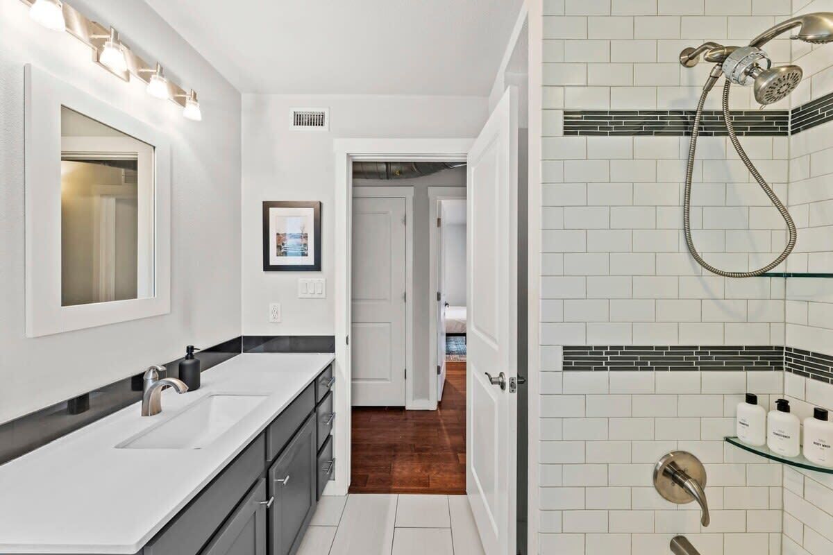 Bathtub, hair dryer, towels