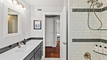 Bathtub, hair dryer, towels