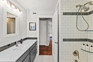 Bathtub, hair dryer, towels