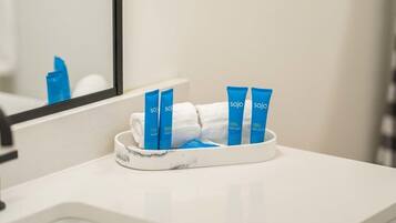 Bathtub, hair dryer, towels