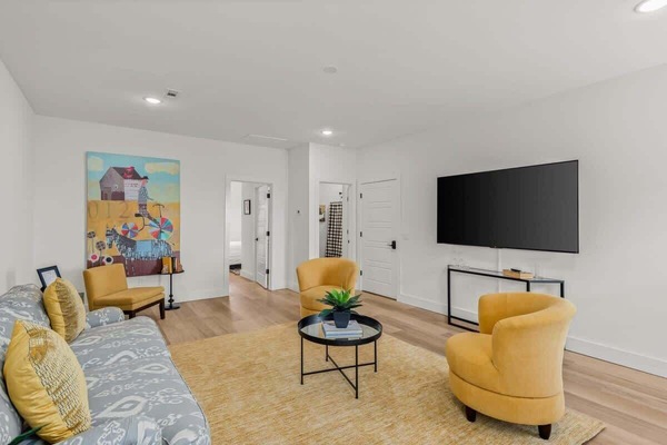 Whether it’s for relaxation or entertaining, this living room setup has everything you need.