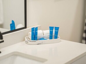 Bathtub, hair dryer, towels