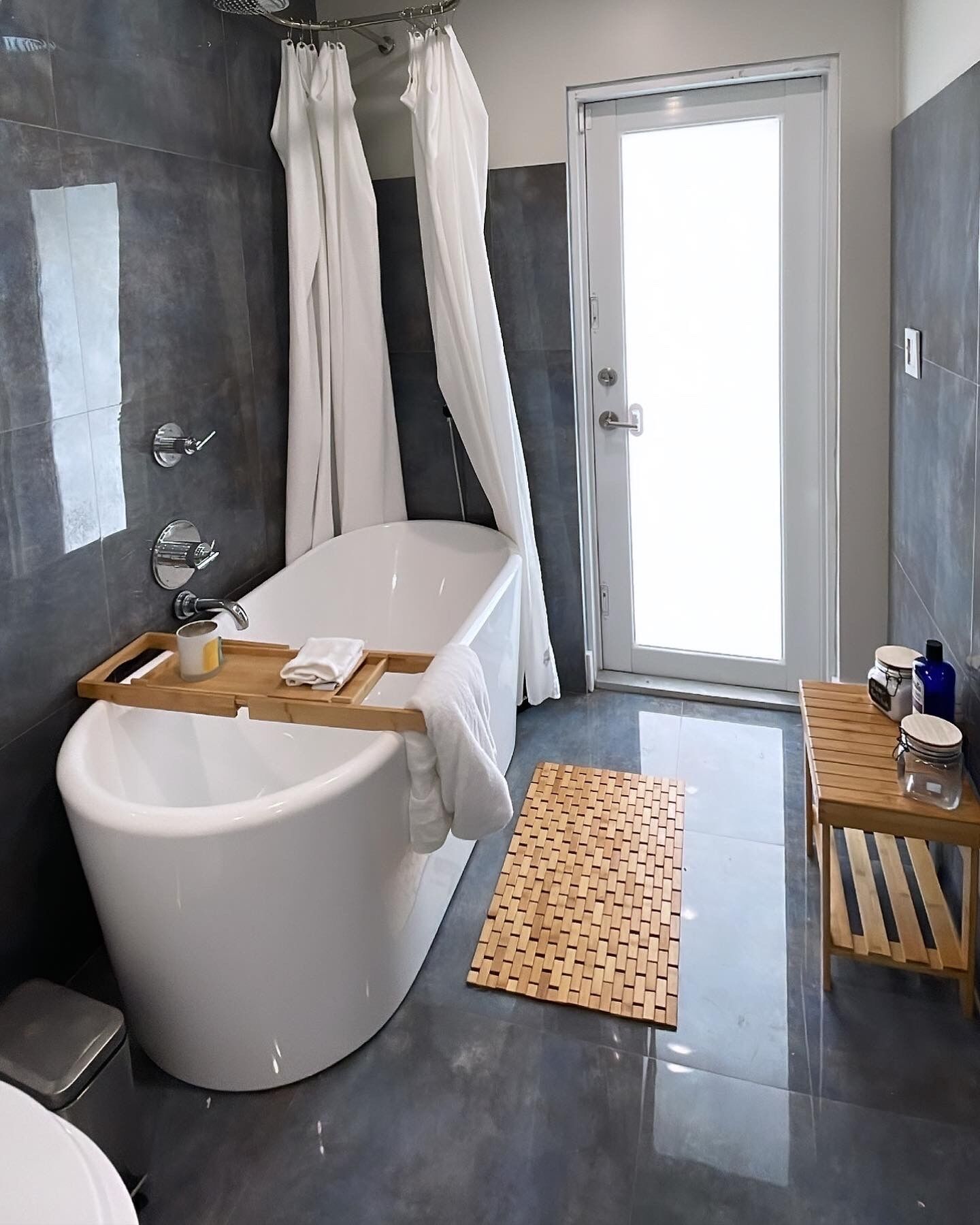 Bathtub, hair dryer, towels, soap