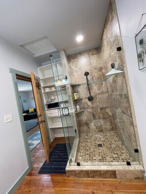 Shower, hair dryer, towels, soap
