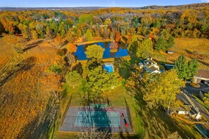 Sport court - Idyllic 50 Acre Retreat w/ Pool, Tennis, Fishing; Built for XL Groups to Escape! (Malvern)