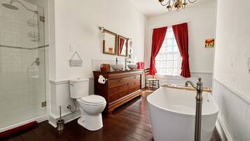 The Old Miss Suite | Bathroom | Separate tub and shower, deep soaking tub, rainfall showerhead