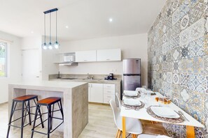 Fridge, microwave, stovetop, coffee/tea maker