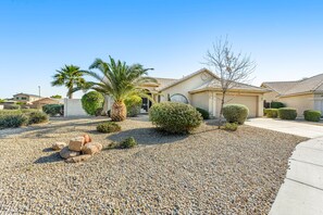 Property grounds - Dog-friendly home with pool, firepit, fast WiFi, central AC, & washer/dryer (Goodyear)