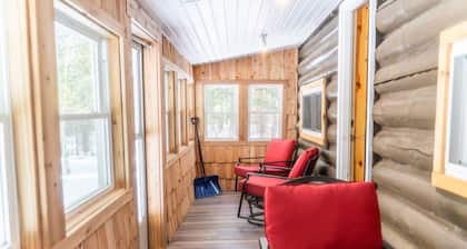 Two bedroom cabin with hot tub and fireplace.