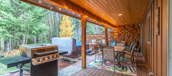 Golf resort home with fairway views, hot tub, sauna, covered deck, & grill