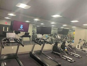Work out in style with our fully equipped gym featuring treadmills and stationary bikes.