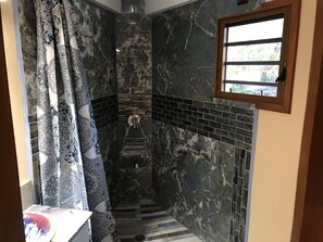 Shower, hair dryer, towels