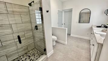 Shower, hair dryer, towels, soap