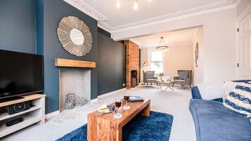 4 bedrooms, laptop workspace, iron/ironing board, bed sheets